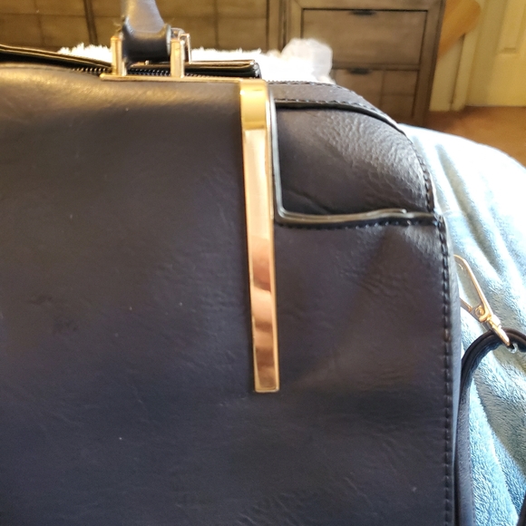 Navy blue multi pocket hand bag with detachable strap. - Picture 10 of 15